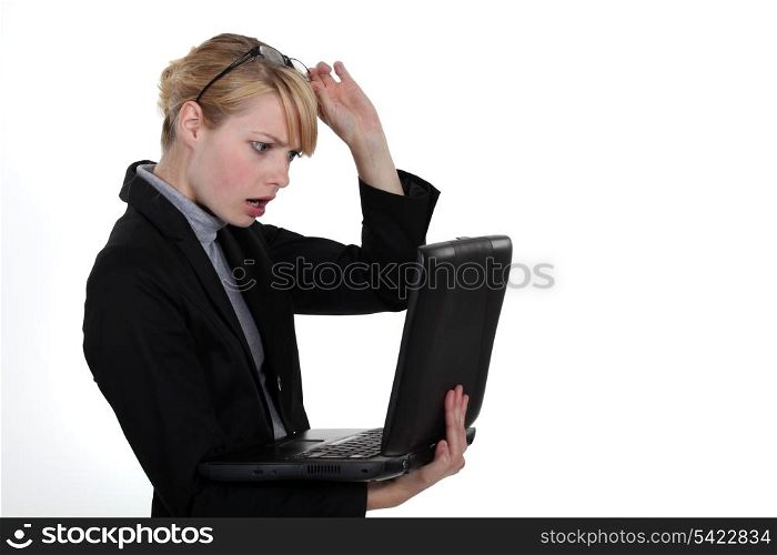 Woman caught in front of computer