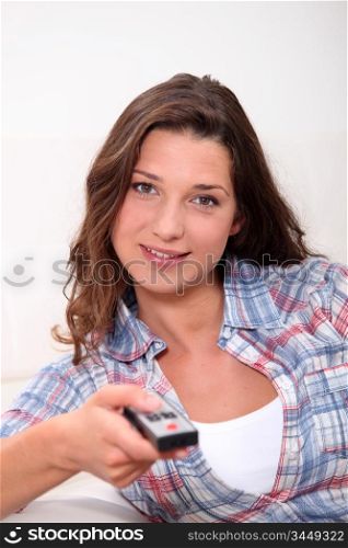 Woman changing channel