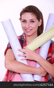 Woman charged with rolls of wallpaper