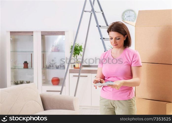 Woman choosing color for flat renewal 