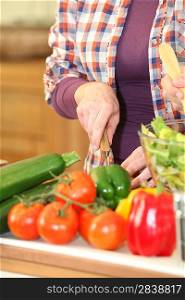 Woman chopping vegetables
