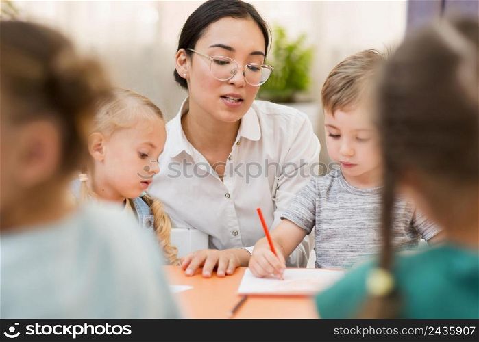 woman communicating with her students