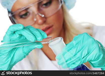 Woman conducting a chemical experiment