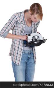 Woman confused by circular saw