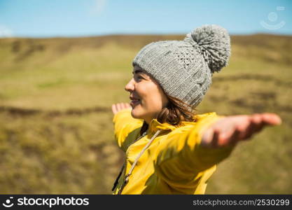 Woman contemplating a beautiful landscape