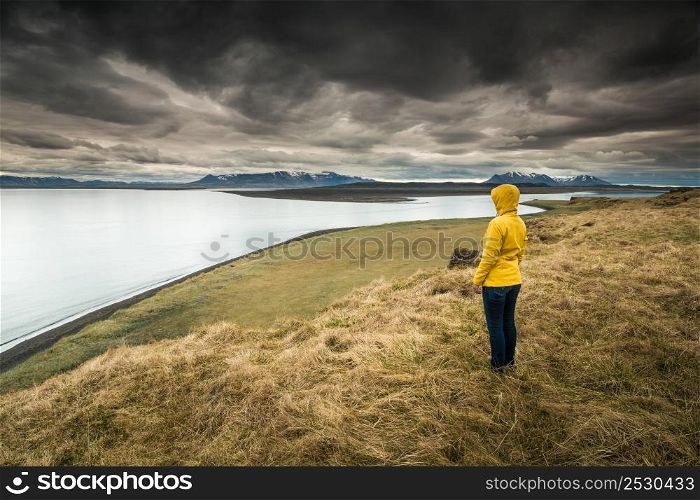 Woman contemplating a beautiful landscape