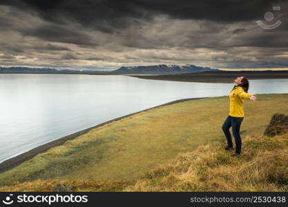 Woman contemplating a beautiful landscape