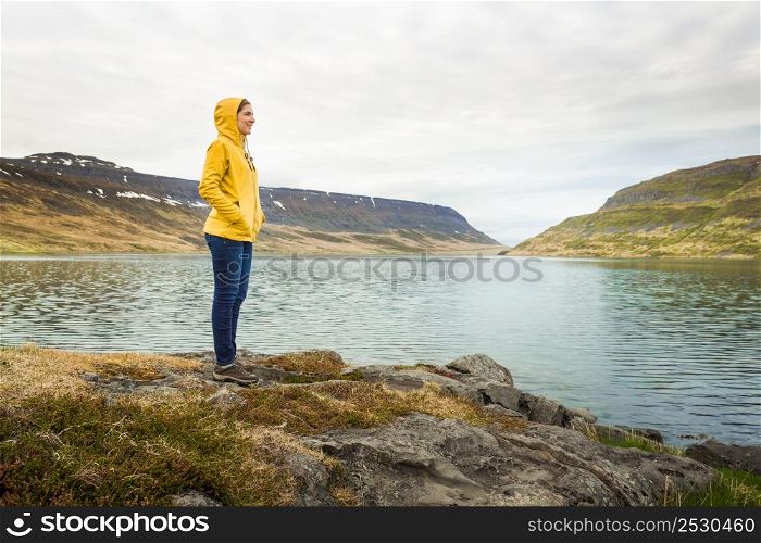 Woman contemplating a beautiful landscape