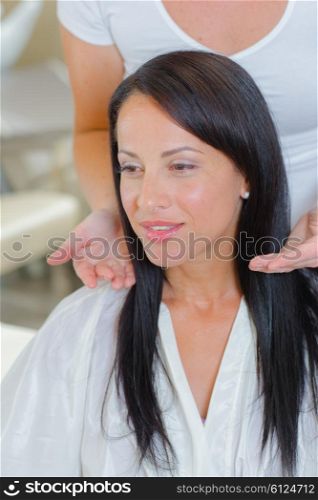 Woman contemplating hair cut