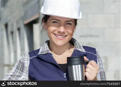 woman contractor worker during coffee time
