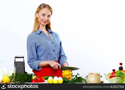 Woman cooking fresh meal at home