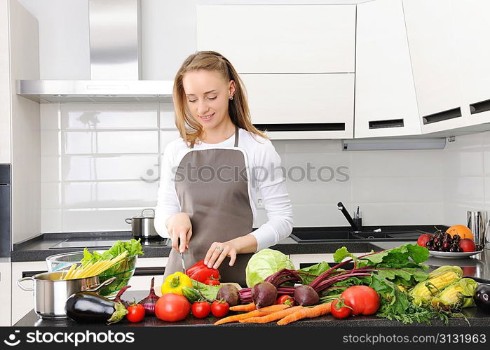 Woman cooking in modern kitchen