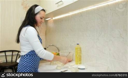 Woman Cooking Ingredients For Chebureks (Crimean Tatar National Dish) In The Kitchen