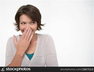 Woman Covering Mouth with Hand