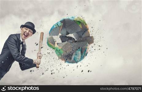 Woman crash Earth planet. Young emotional woman with baseball bat. Elements of this image are furnished by NASA