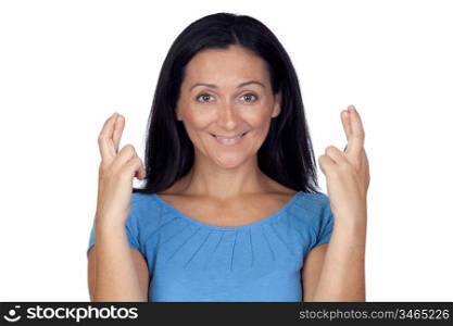 Woman crossing their fingers as sign of luck isolated on a over white background