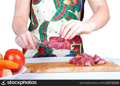 Woman cutting beef isolated on white background