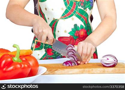 Woman cutting onion isolated on white background
