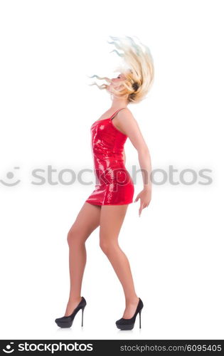 Woman dancing in red dress isolated on white