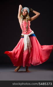 Woman dancing spanish dances on white