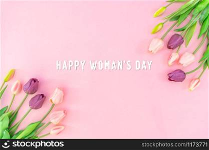 Woman Day composition. Tulip flowers on pink background Flat lay top view copy space