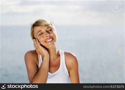 Woman delighted on the phone