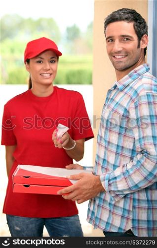 Woman delivering pizza