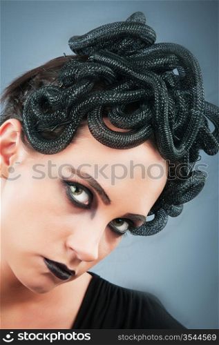Woman depicting the concept og Evil (Medusa Gorgon)