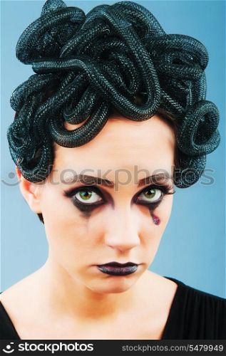 Woman depicting the concept og Evil (Medusa Gorgon)