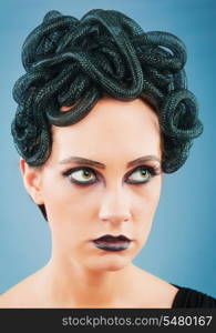 Woman depicting the concept og Evil (Medusa Gorgon)