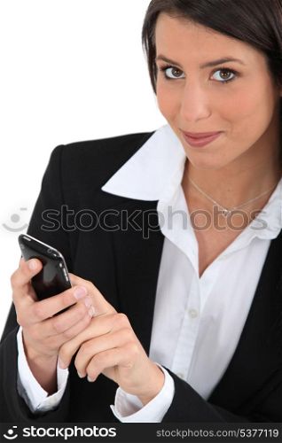 Woman dialing a phone nulmber