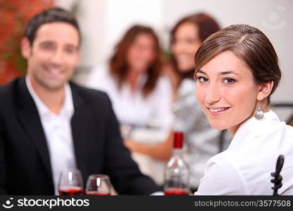 Woman dining with her partner in a restaurant