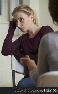 Woman Discussing Problems With Counselor