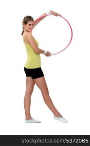 Woman displaying hula-hoop
