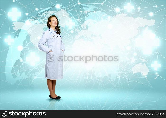 Woman doctor. Image of young woman doctor against media background