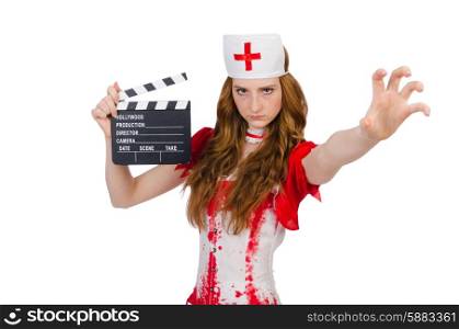 Woman doctor in bloody uniform with movie clapperboard