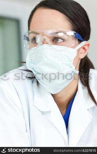 Woman Doctor or Scientist Wearing Surgical Face Mask