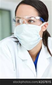 Woman Doctor or Scientist Wearing Surgical Face Mask