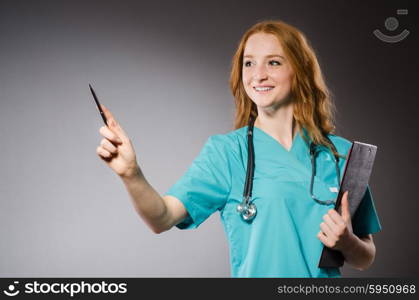 Woman doctor pressing virtual button