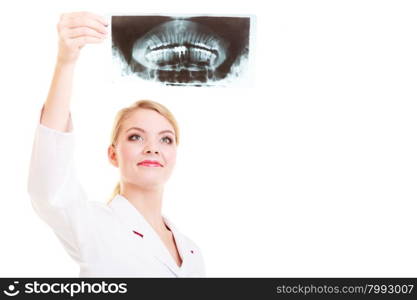 Woman doctor radiologist in lab coat with clipboard looking at the x-ray isolated. Medical person for health insurance.