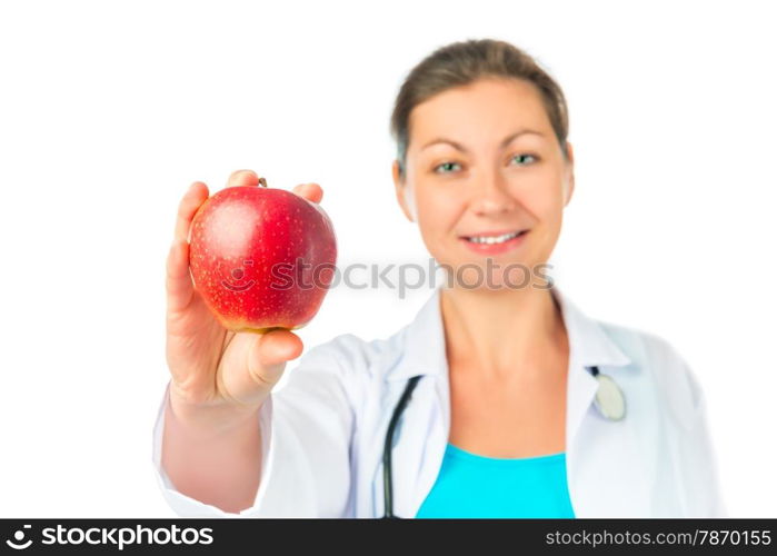 woman Doctor shows a beautiful red apple