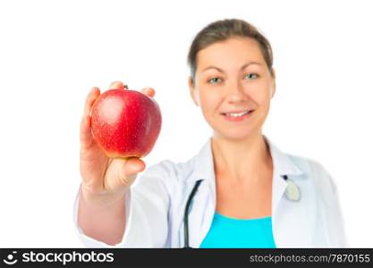 woman Doctor shows a beautiful red apple