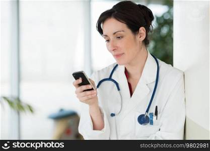 woman doctor talking on phone