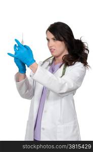 Woman doctor with a medical syringe with medicine