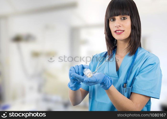 woman doctor with pills in hand closeup