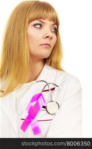 Woman doctor with stethoscope and pink ribbon aids symbol on chest. Healthcare, medicine breast cancer awareness concept.