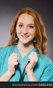 Woman doctor with the stethoscope