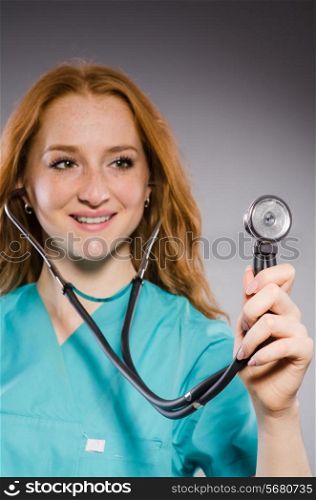 Woman doctor with the stethoscope