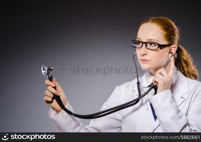 Woman doctor with the stethoscope