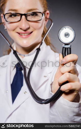 Woman doctor with the stethoscope